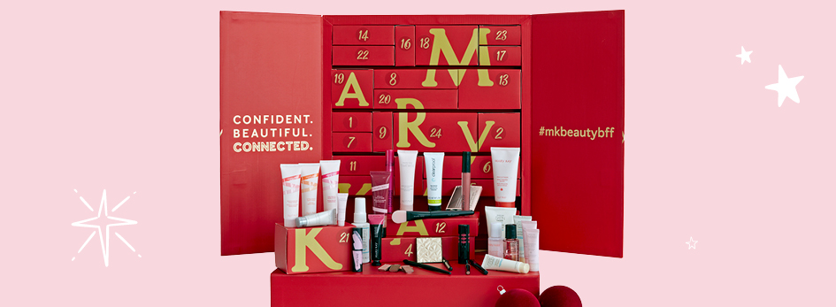 Ein geöffneter, rot-goldener Mary Kay Adventskalender mit 24 Türchen und Mary Kay Produkten (Beispielfüllung)
