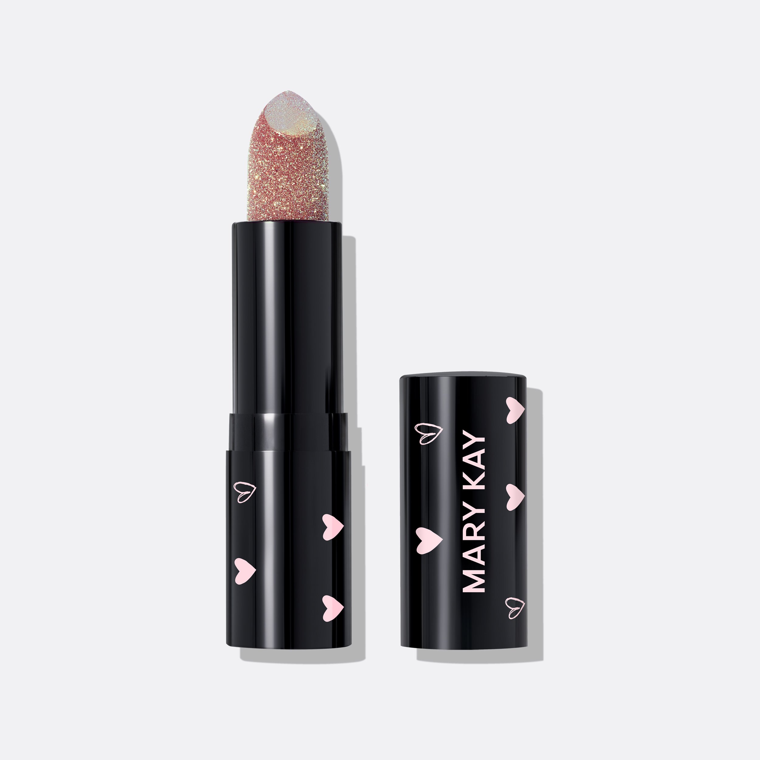 Uncapped tube of limited-edition Mary Kay Sparkle Cream Lipstick in shade Positive Impact