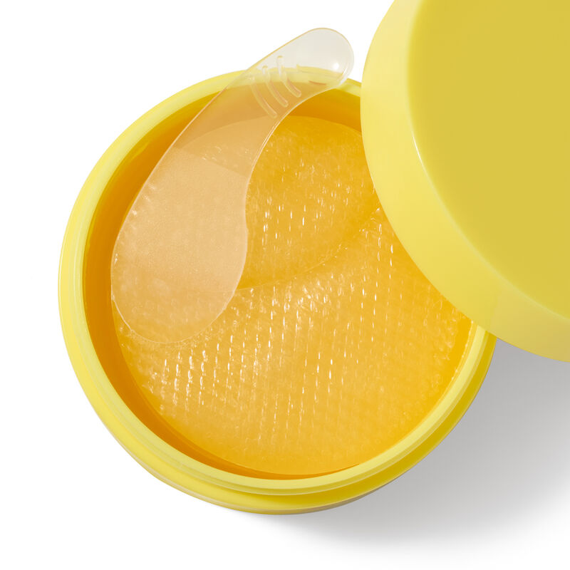 Nahaufnahme von Mary Kay Snail Gel Face Patches in einem gelben Behalter