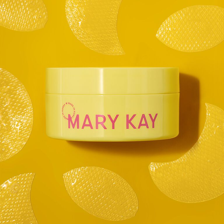 Ein gelber Tiegel der Mary Kay&reg; Snail Gel Face Patches vor gelbem Hintergrund