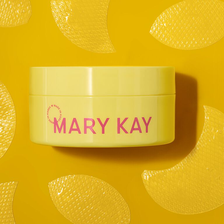 Gelber Tiegel der Mary Kay&reg; Snail Gel Face Patches, umgeben von gelben Hydrogel-Patches