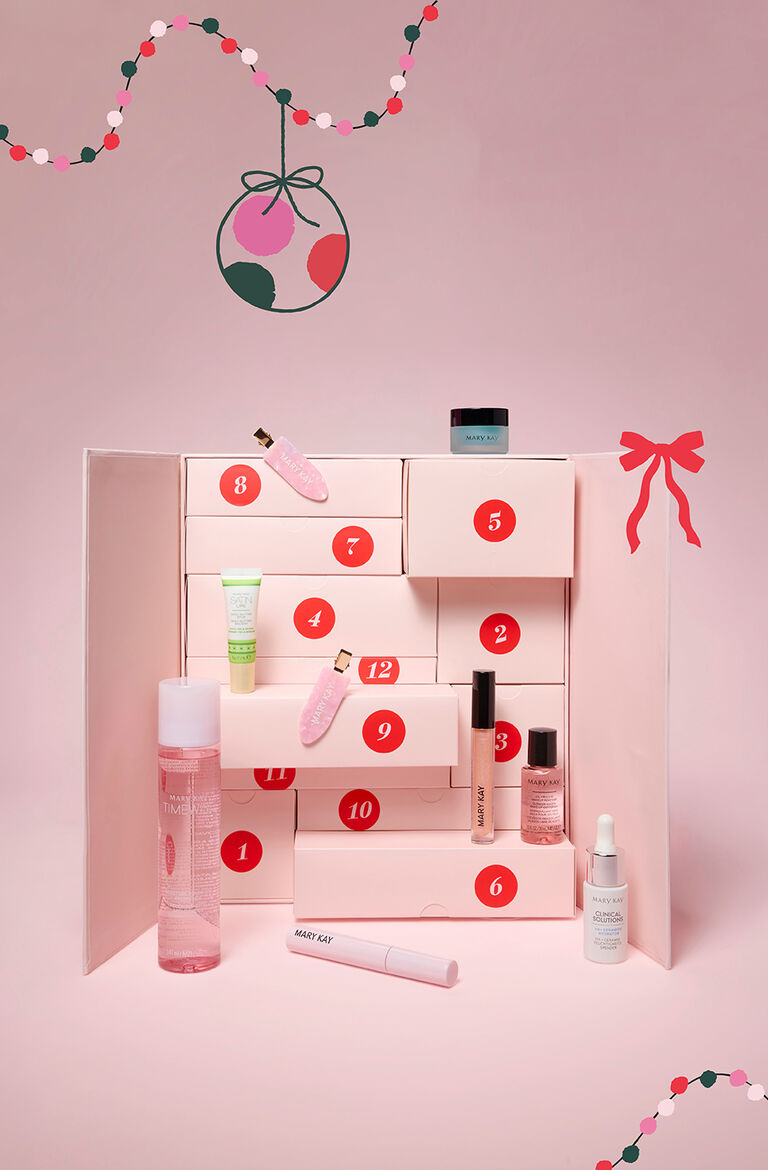 Der "Care" Adventskalender von Mary Kay in rosa (aufgeklappt: aus einigen T&uuml;rchen kommen Beauty Produkte heraus (Eye Gel, Lippenpflege, Lipgloss, Mascara, Toner,...)