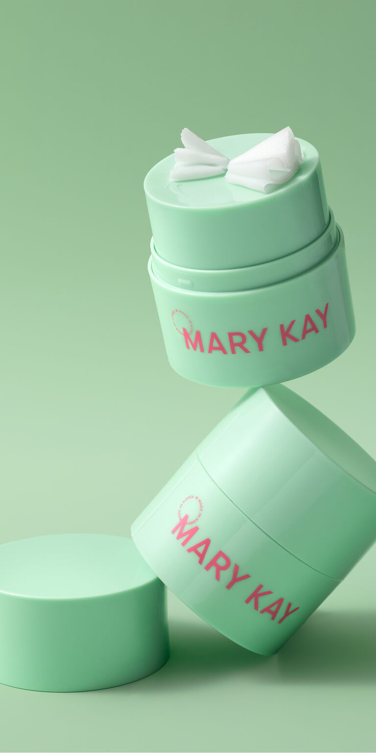 Schwebender Stapel gr&uuml;ner Tiegel des Mary Kay&reg; Melt-In Cleansing Balm