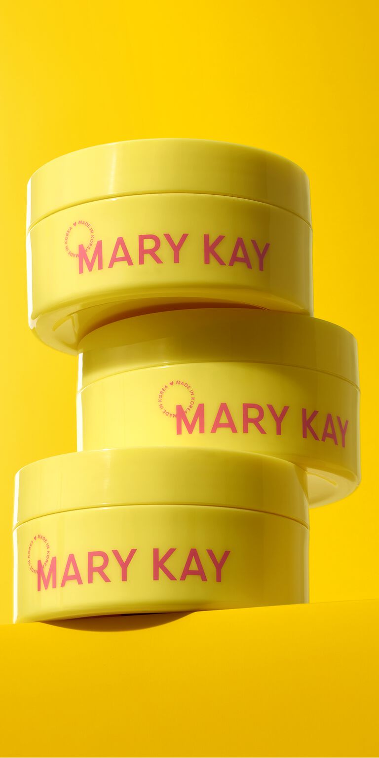 Stapel aus drei gelben Tiegeln der Mary Kay&reg; Snail Gel Face Patches